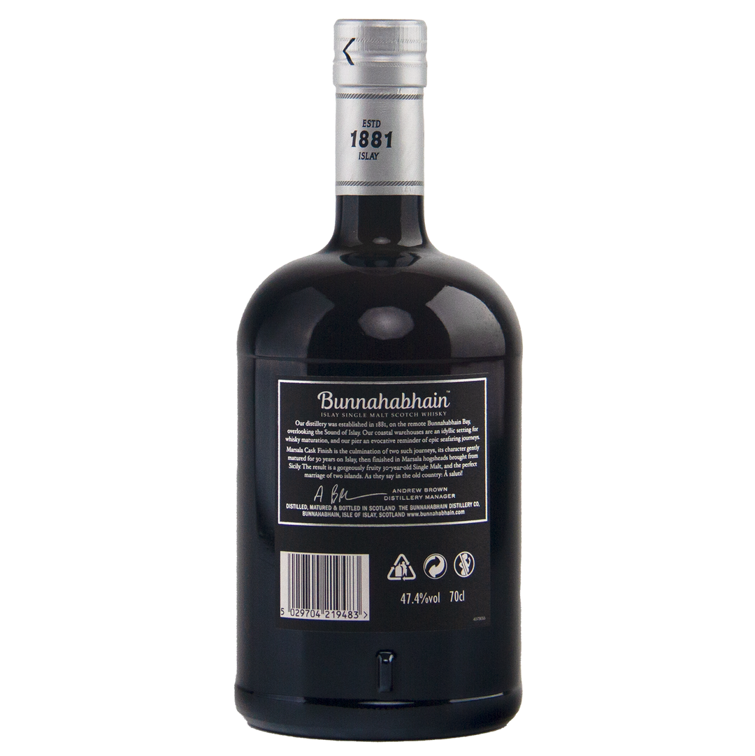 A dark glass bottle of Bunnahabhain 30 Year Old 1988 Vintage single malt whisky shown from the back, with a silver cap, detailed label, barcode, recycling symbols. The rounded 70cl bottle has 46.3% ABV and a Marsala cask finish.