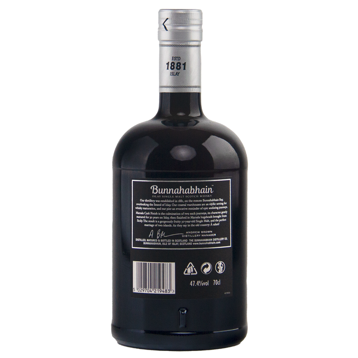 A dark glass bottle of Bunnahabhain 30 Year Old 1988 Vintage single malt whisky shown from the back, with a silver cap, detailed label, barcode, recycling symbols. The rounded 70cl bottle has 46.3% ABV and a Marsala cask finish.