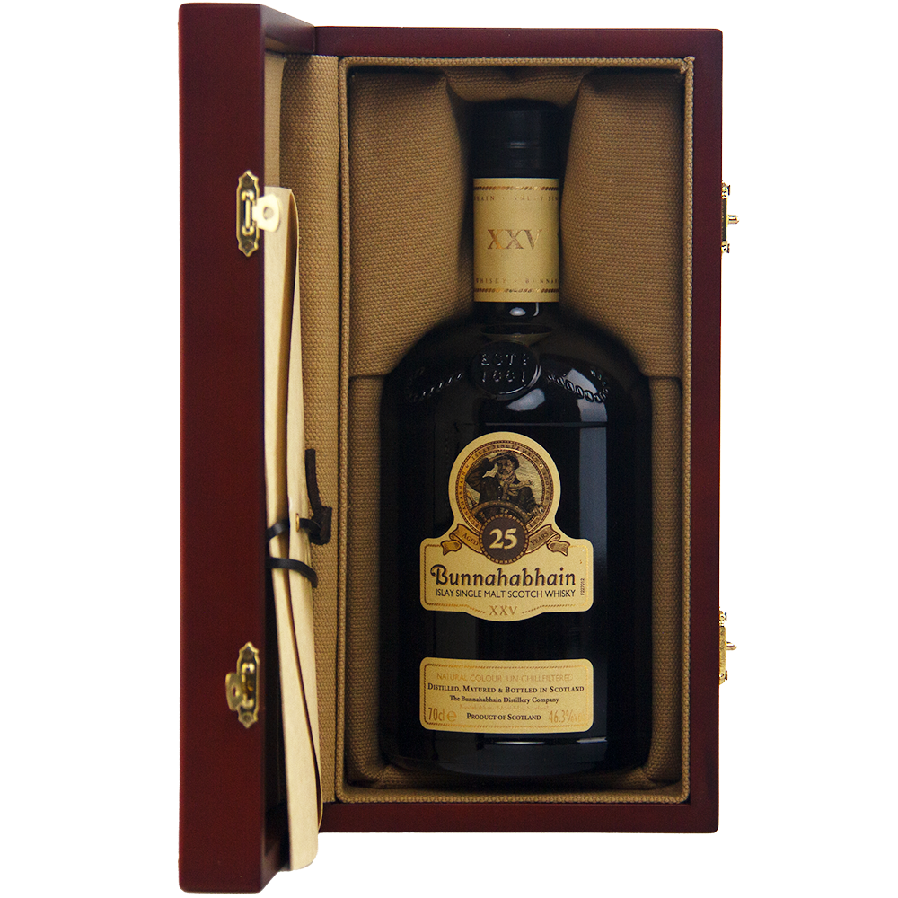 A bottle of Bunnahabhain XXV 25 Year Old Single Malt Scotch Whisky stands upright in an open wooden box lined with tan fabric, with a scroll attached to the left side of this limited edition presentation.