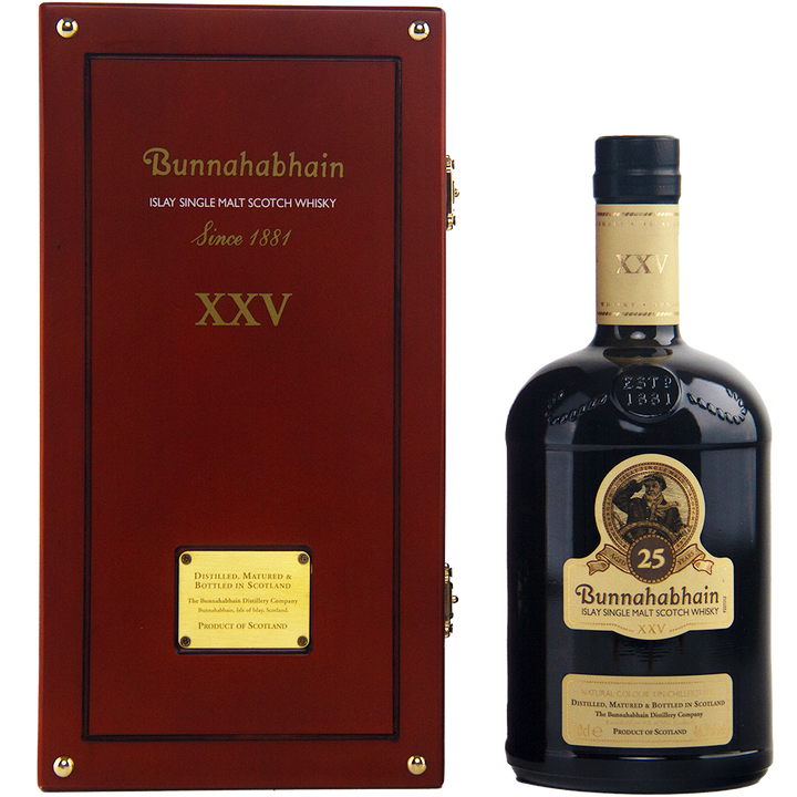 A bottle of Bunnahabhain XXV 25 Year Old Single Malt Scotch Whisky is displayed beside its stylish dark wooden box with gold accents, highlighting the refined presentation of this exclusive single malt.