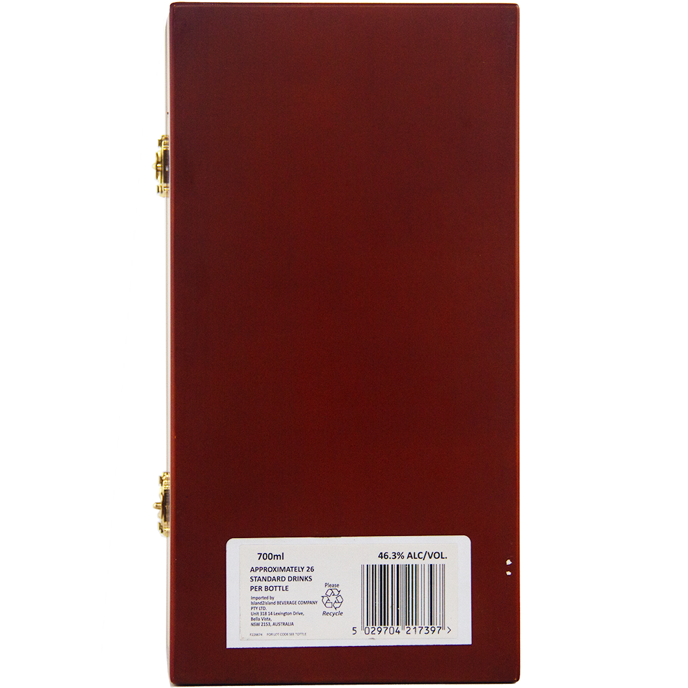 A rectangular wooden box with gold hinges, finished in glossy reddish-brown, is shown from the back. A white label displays a barcode and product details for Bunnahabhain XXV 25 Year Old Single Malt Scotch Whisky.