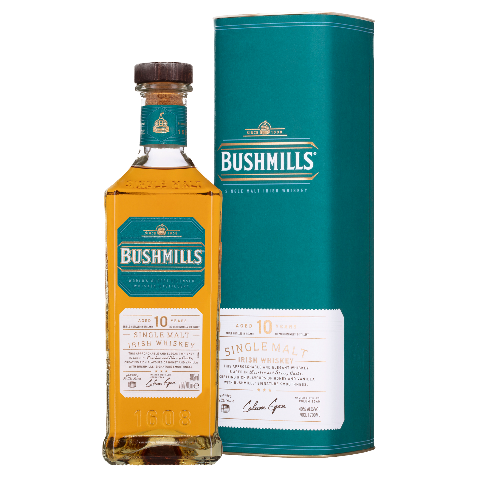 A bottle of Bushmills 10 Year Old Single Malt Irish Whiskey stands beside its matching green cylindrical box, both adorned with gold and white labels featuring product details and the signature, highlighting this triple-distilled spirit.