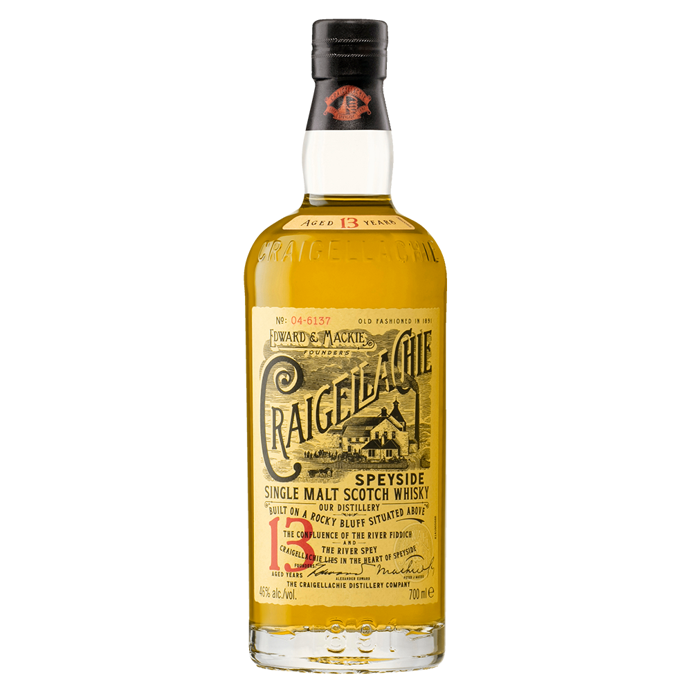 A bottle of Craigellachie 13 Year Old Single Malt Whisky, featuring a yellow label with black and red text and vintage-style illustrations.