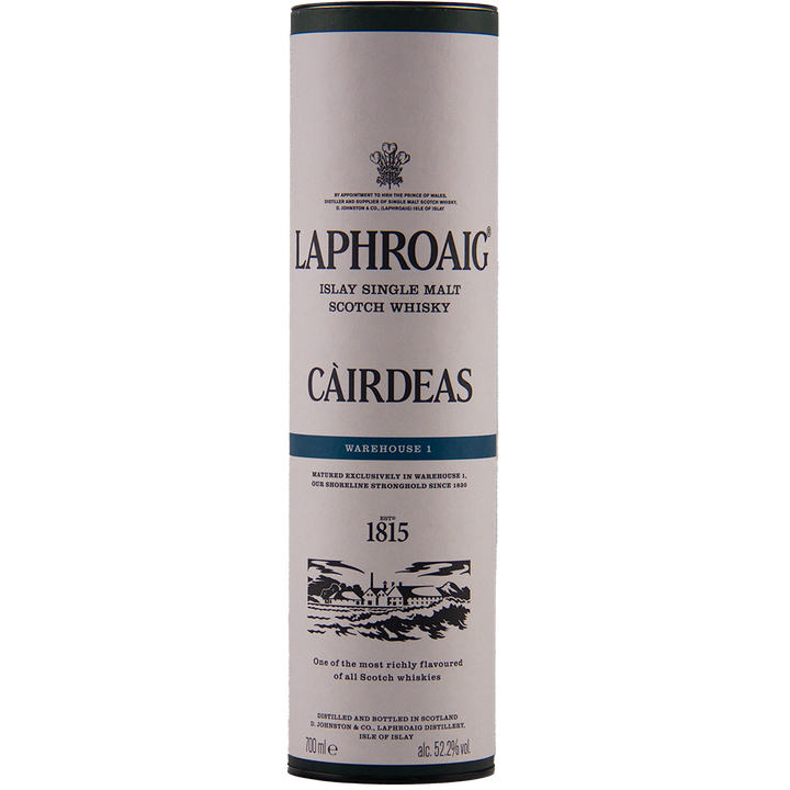 A cylindrical tube packaging for Laphroaig Cairdeas 2022 Warehouse 1, a limited-release whisky, with black and gold text on white and an illustration of the iconic Islay single malt distillery at the bottom.