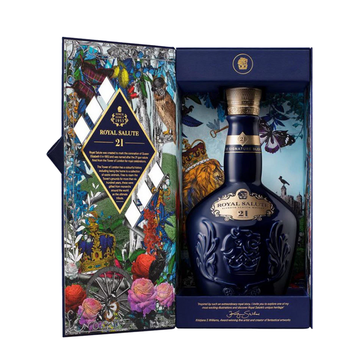The Royal Salute 21 Year Old Blended Scotch Whisky comes in a blue box with gold accents, featuring colorful illustrations of flowers, an owl, and other animals—emphasizing the luxury of this aged blended Scotch.