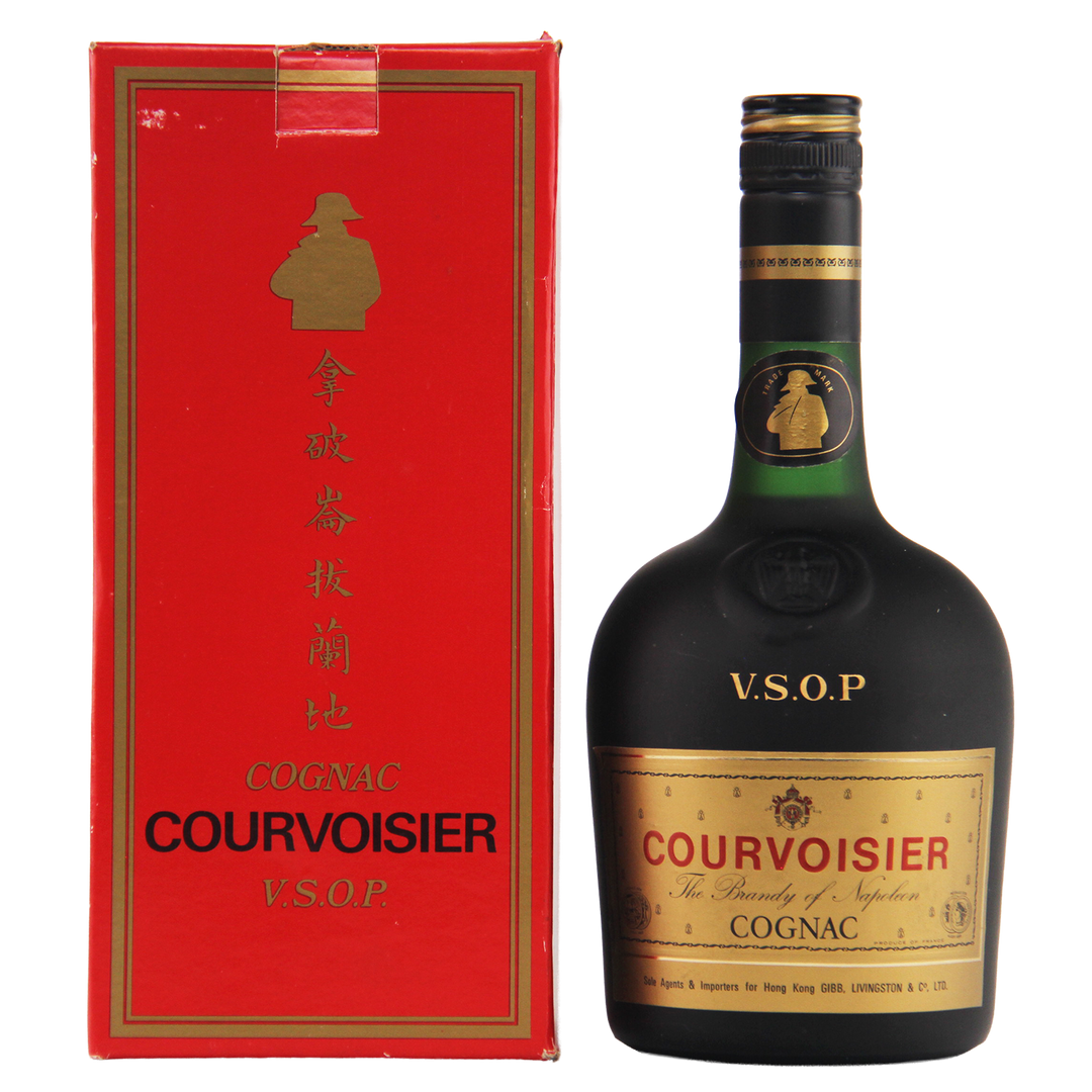 Courvoisier VSOP cognac bottle and red box on a white background