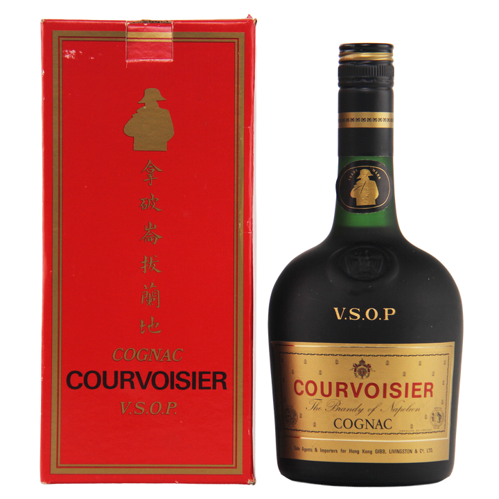 Courvoisier VSOP cognac bottle and red box on a white background
