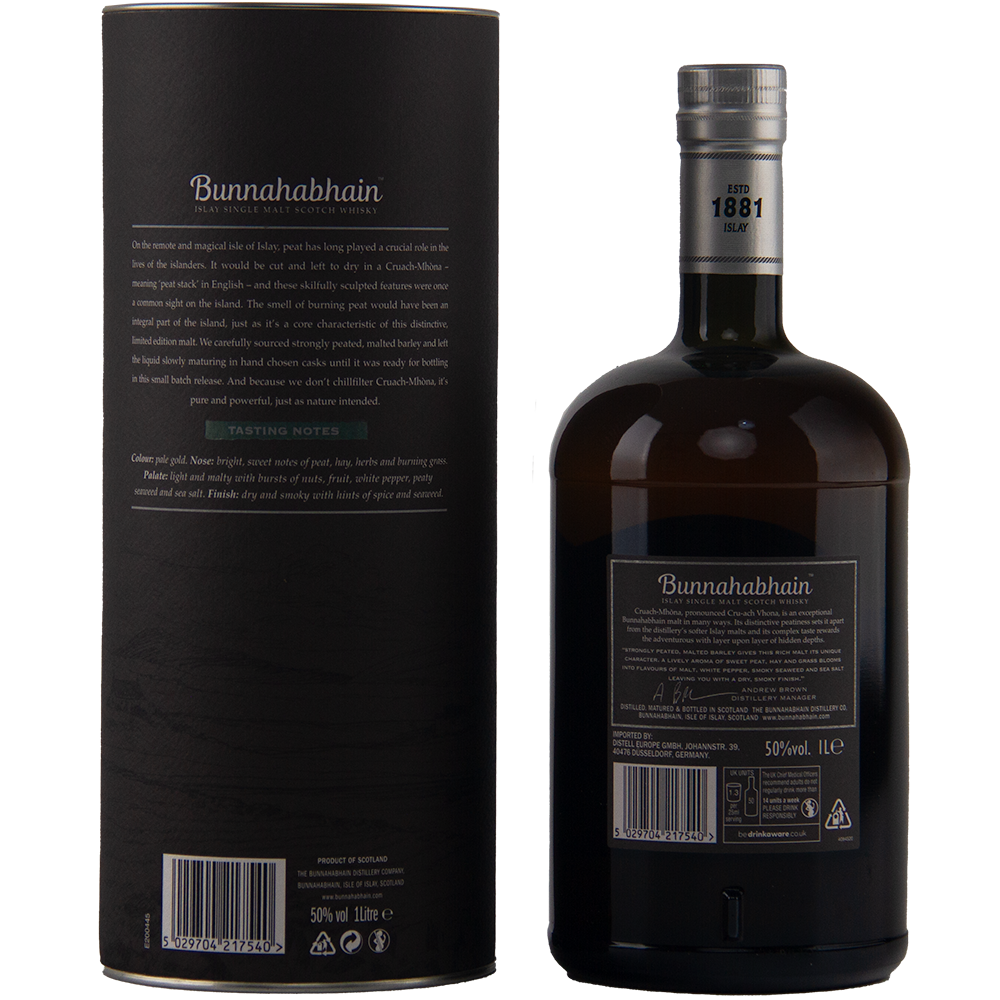 A bottle of Bunnahabhain Cruach Mhona Single Malt Scotch Whisky and its black cylindrical packaging are shown from the back, both featuring detailed text and a minimalist, elegant Islay design.