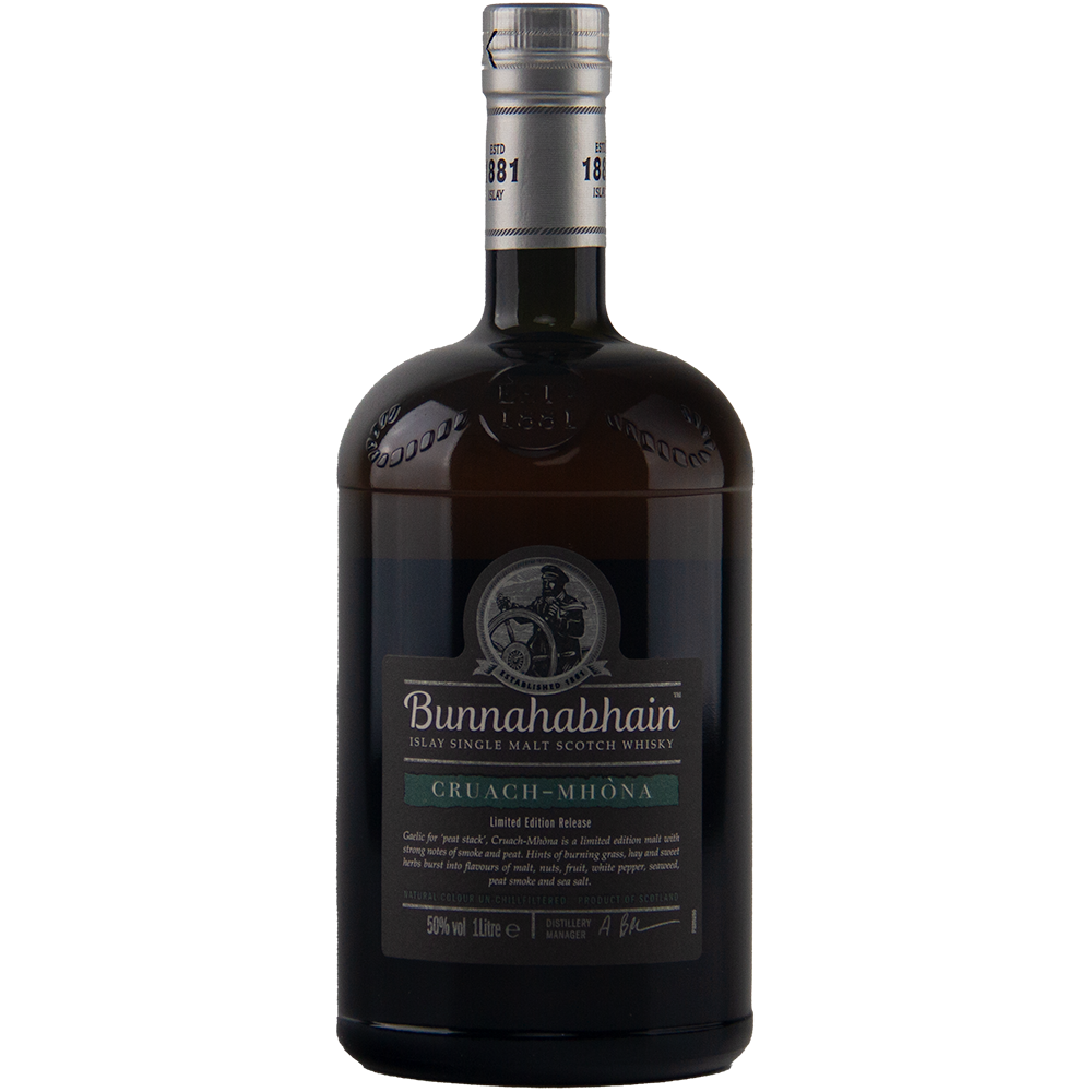 A dark glass bottle of Bunnahabhain Cruach Mhona Single Malt Scotch Whisky, with a black and silver label accented with green and a silver cap, is displayed against a plain light background.