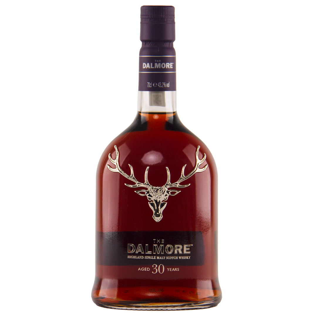 A bottle of The Dalmore 30 Year Old Single Malt Scotch Whisky features a dark liquid, gold stag logo, and a purple label and cap set against a white background.