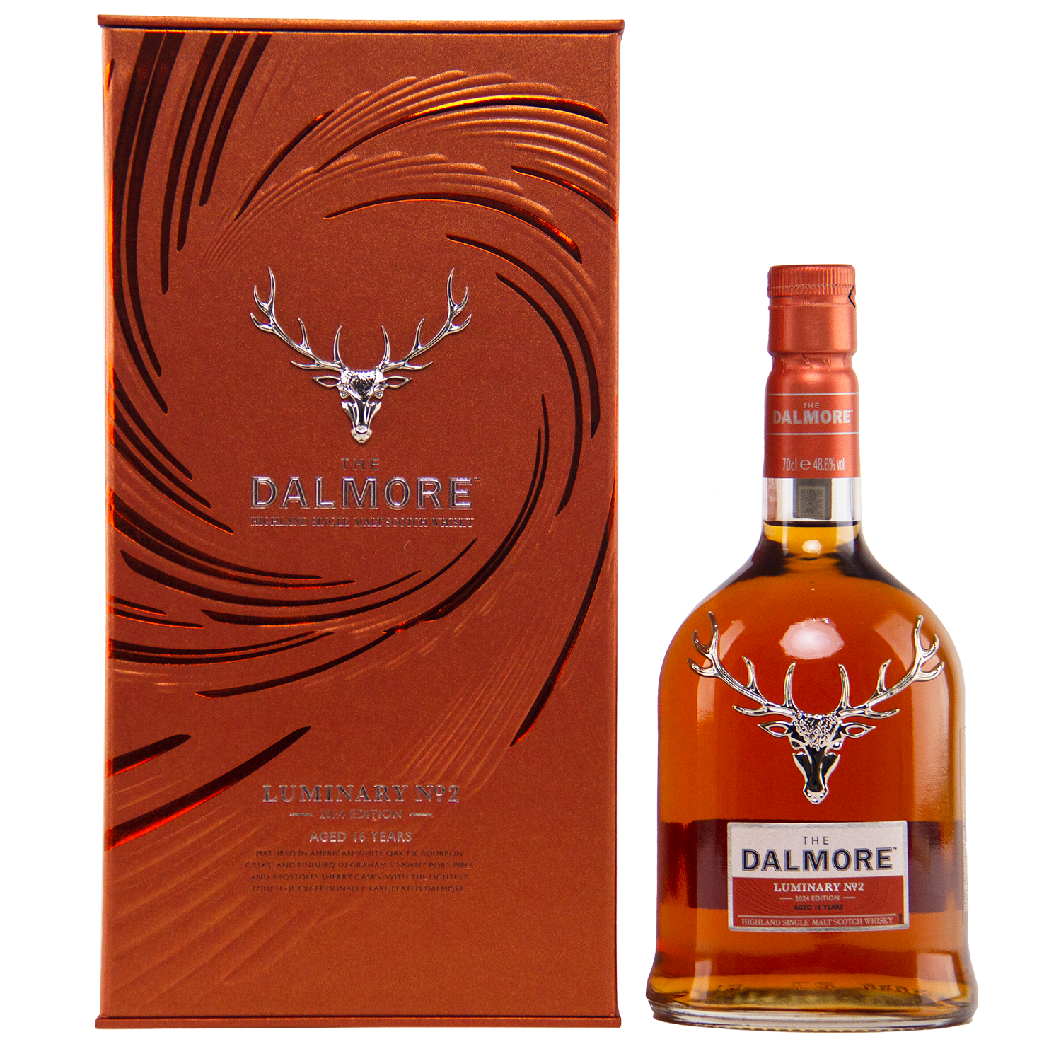 A bottle of The Dalmore Luminary No. 2 16 Year Old Single Malt Scotch Whisky stands beside its matching metallic orange box, both adorned with the silver stag logo and embossed patterns—capturing the essence of Dalmore’s luxury.