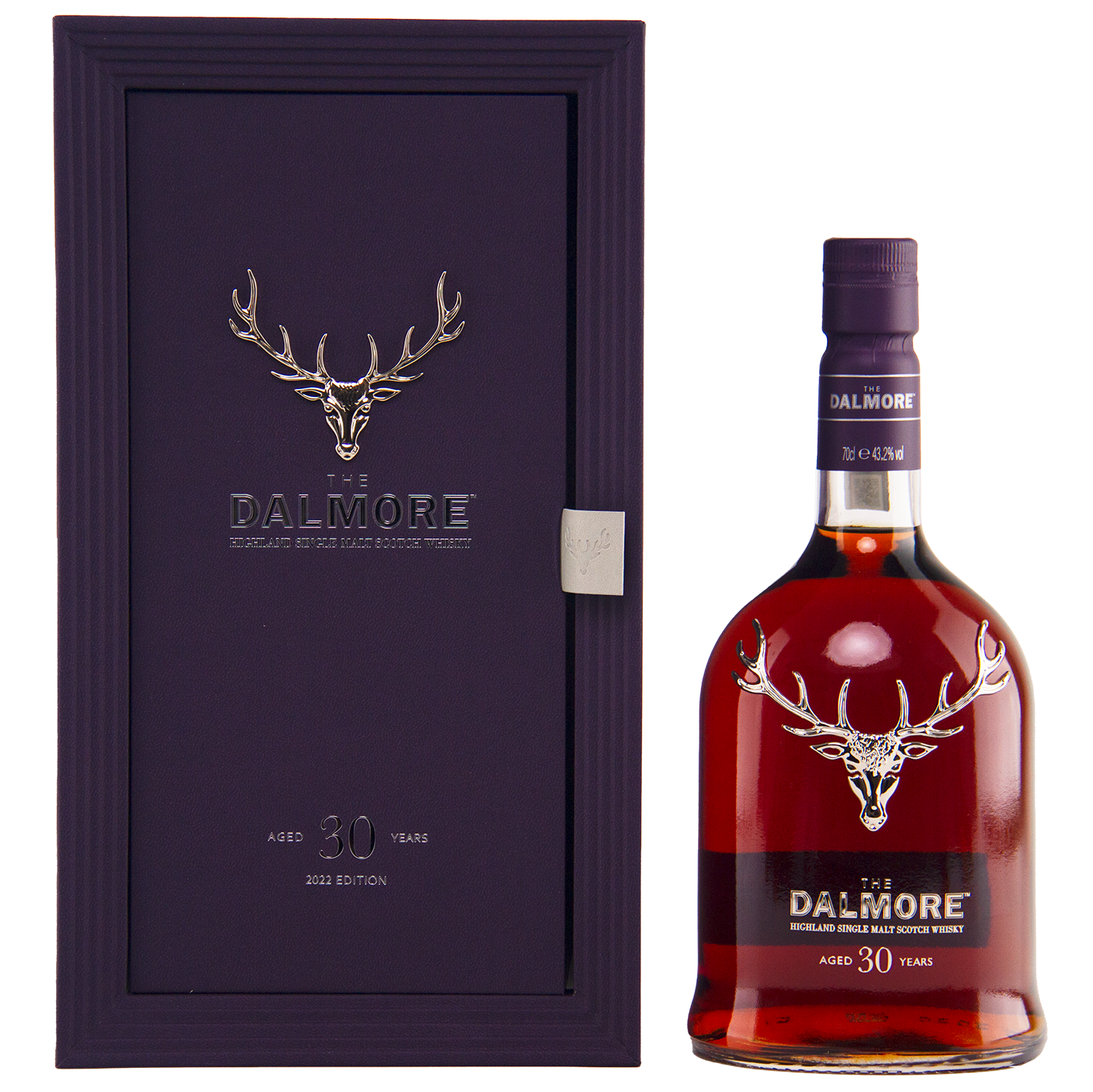 A bottle of The Dalmore 30 Year Old Single Malt Scotch stands beside its elegant purple case, both adorned with a silver stag logo and refined labeling.