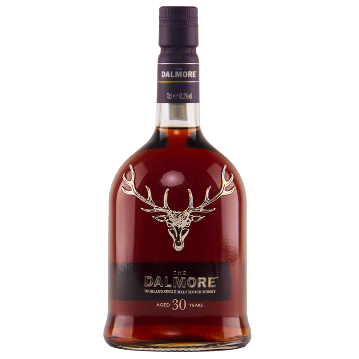 A bottle of The Dalmore 30 Year Old Single Malt Scotch, with dark amber whisky, a silver stag logo, elegant labeling, and a dark cap—capturing the refined essence of this luxury Highland single malt.
