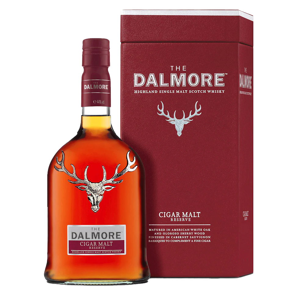 A bottle of The Dalmore Cigar Malt Reserve Single Malt Scotch Whisky stands beside its maroon box, both adorned with a silver stag logo and white text—ideal for pairing with a fine cigar.