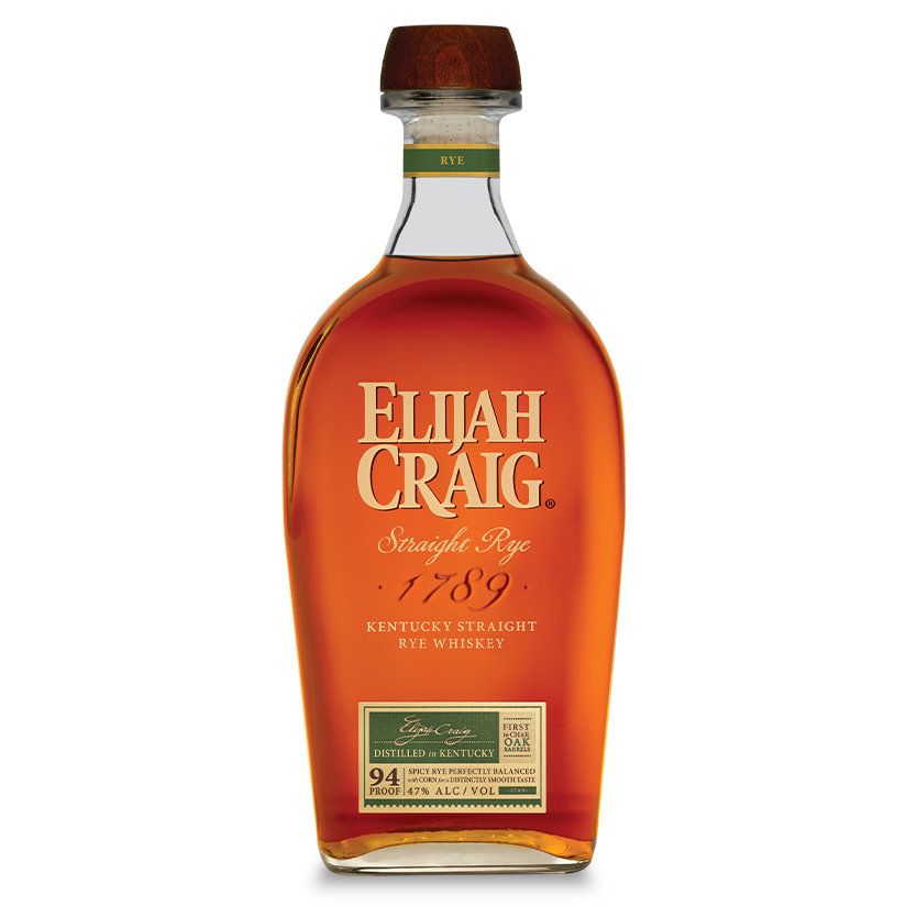 A bottle of Elijah Craig Kentucky Straight Rye Whiskey features a wooden cap, amber liquid, and gold and white labeling on a clear, curved glass bottle.
