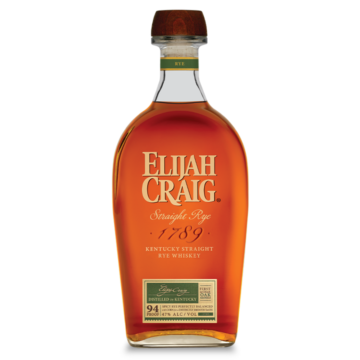 A bottle of Elijah Craig Kentucky Straight Rye Whiskey features a wooden cap, amber liquid, and gold and white labeling on a clear, curved glass bottle.