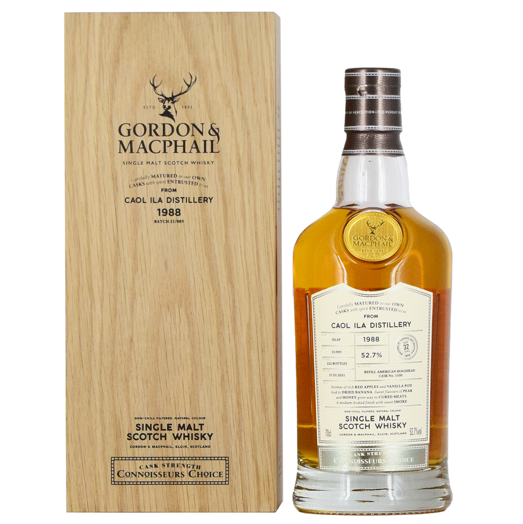 A bottle of Gordon & Macphail Caol Ila 1988 32 Year Old Single Malt Scotch Whisky sits beside its wooden box, both adorned with elegant labels and refined branding.