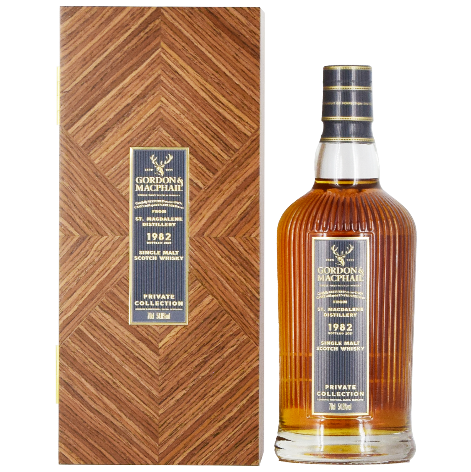 A bottle of Gordon & MacPhail St. Magdalene 1982 39 Year Old Single Malt Scotch Whisky 700ml stands beside its matching wood-patterned box, both adorned with dark blue and gold labels.