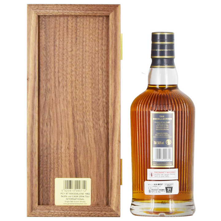 A bottle of Gordon & MacPhail St. Magdalene 1982 39 Year Old Single Malt Scotch Whisky 700ml with a black and gold striped cap stands upright next to its wooden box, product details visible on the back label, against a white background.