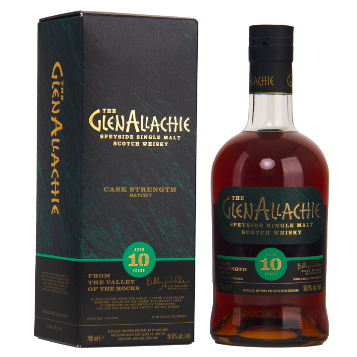 A bottle of GlenAllachie 10 Year Old Cask Strength Batch 7 Single Malt Whisky stands beside its green and black box, both with gold and teal lettering—a bold limited release from Speyside.