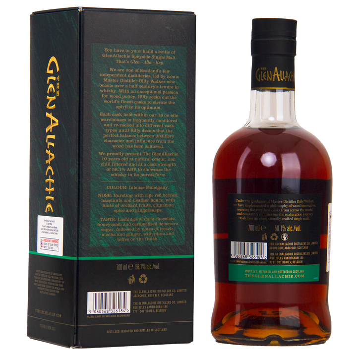 A bottle of GlenAllachie 10 Year Old Cask Strength Batch 9 single malt Scotch whisky stands next to its box. The dark amber spirit, matured in sherry casks, features green and gold labels and tasting notes on both bottle and packaging.