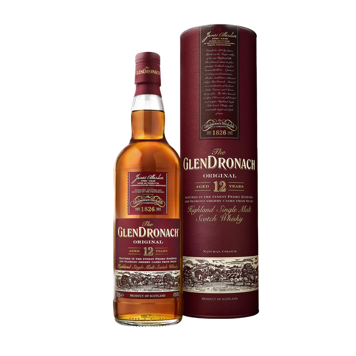 A bottle of Glendronach 12 Year Old Single Malt Scotch Whisky is shown next to its cylindrical box, both with deep red labels accented by gold and white text, emphasizing its sherry cask maturation.