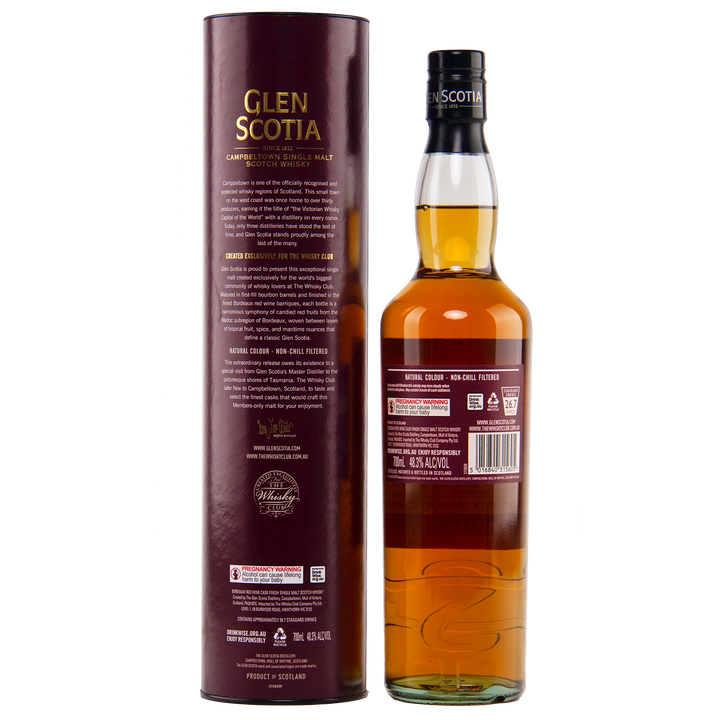A bottle of Glen Scotia 2013 Bordeaux Single Cask single malt Scotch whisky stands beside its tall maroon box, both featuring gold and white labeling. The amber whisky was finished in a Bordeaux red wine cask with detailed product info displayed.