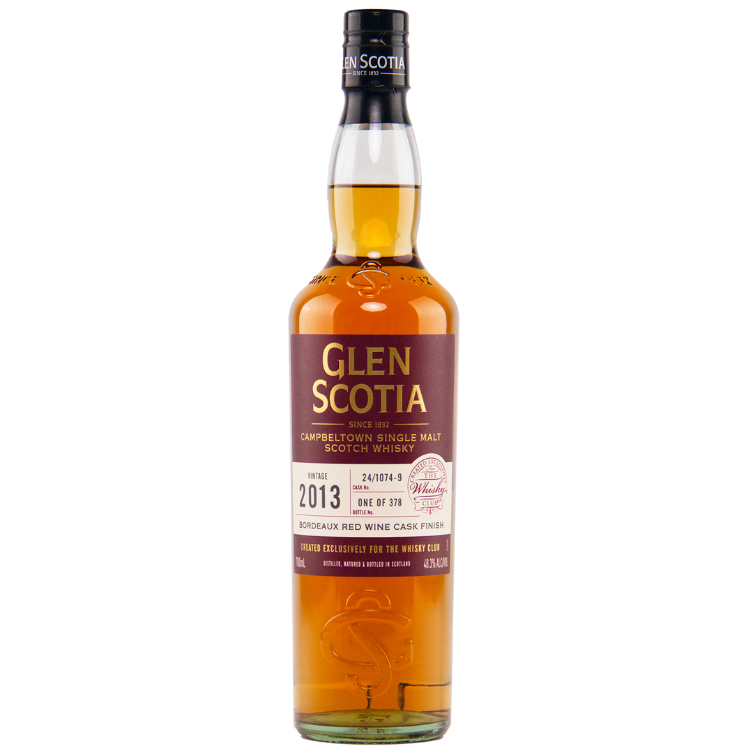 A bottle of Glen Scotia 2013 Bordeaux Single Cask Campbeltown single malt, finished in a Bordeaux wine cask. The maroon label with gold and white text states it's limited to just 373 bottles.