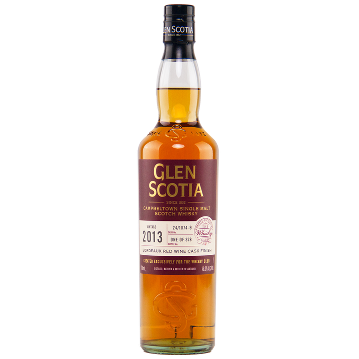 A bottle of Glen Scotia 2013 Bordeaux Single Cask Campbeltown single malt, finished in a Bordeaux wine cask. The maroon label with gold and white text states it's limited to just 373 bottles.