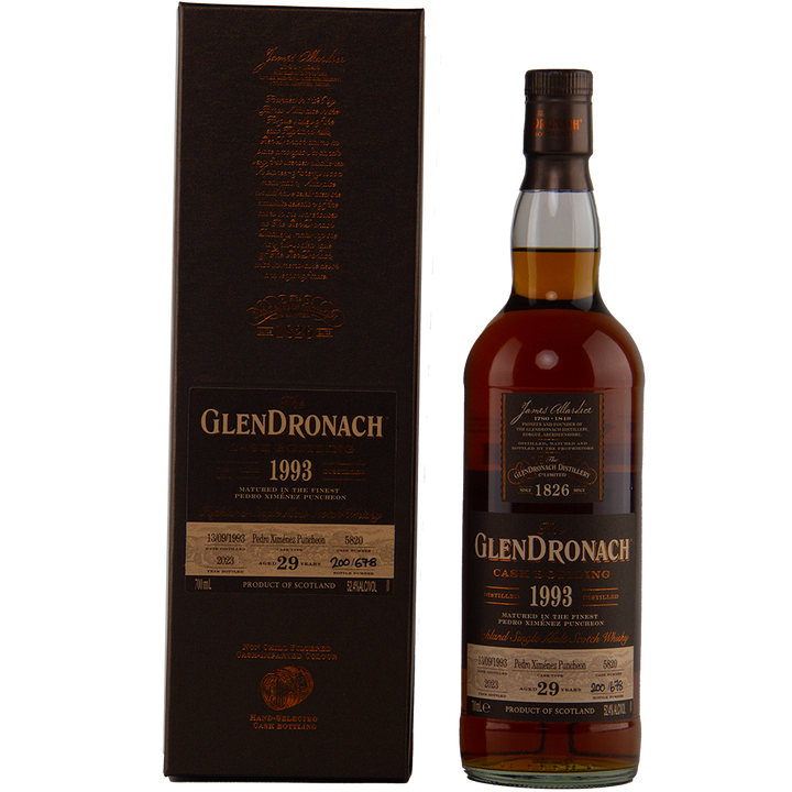 A bottle of Glendronach 1993 29 Year Old stands beside its brown display box, both adorned with gold and cream text highlighting this exceptional single cask release’s age, cask type, and distillery details.