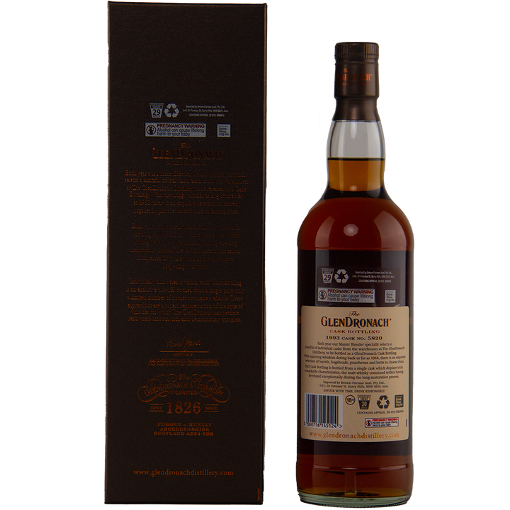 A bottle of Glendronach 1993 29 Year Old stands beside its dark brown box, both shown from the back to highlight cask bottling details and rich information about this single cask release.
