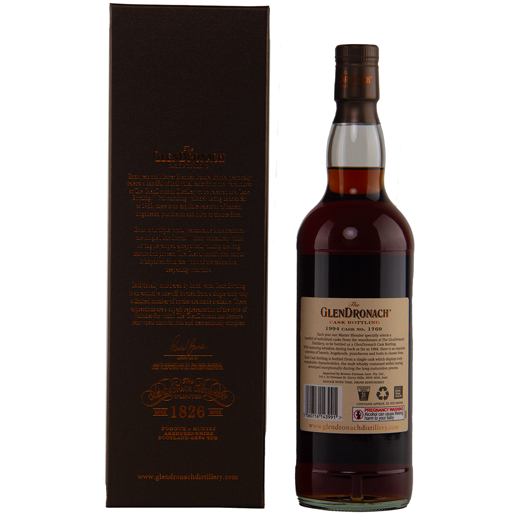 A Glendronach 1994 28 year old single malt whisky with a dark brown label stands beside its matching brown box, both adorned with gold and white text and the distillery’s logos highlighting this limited release.
