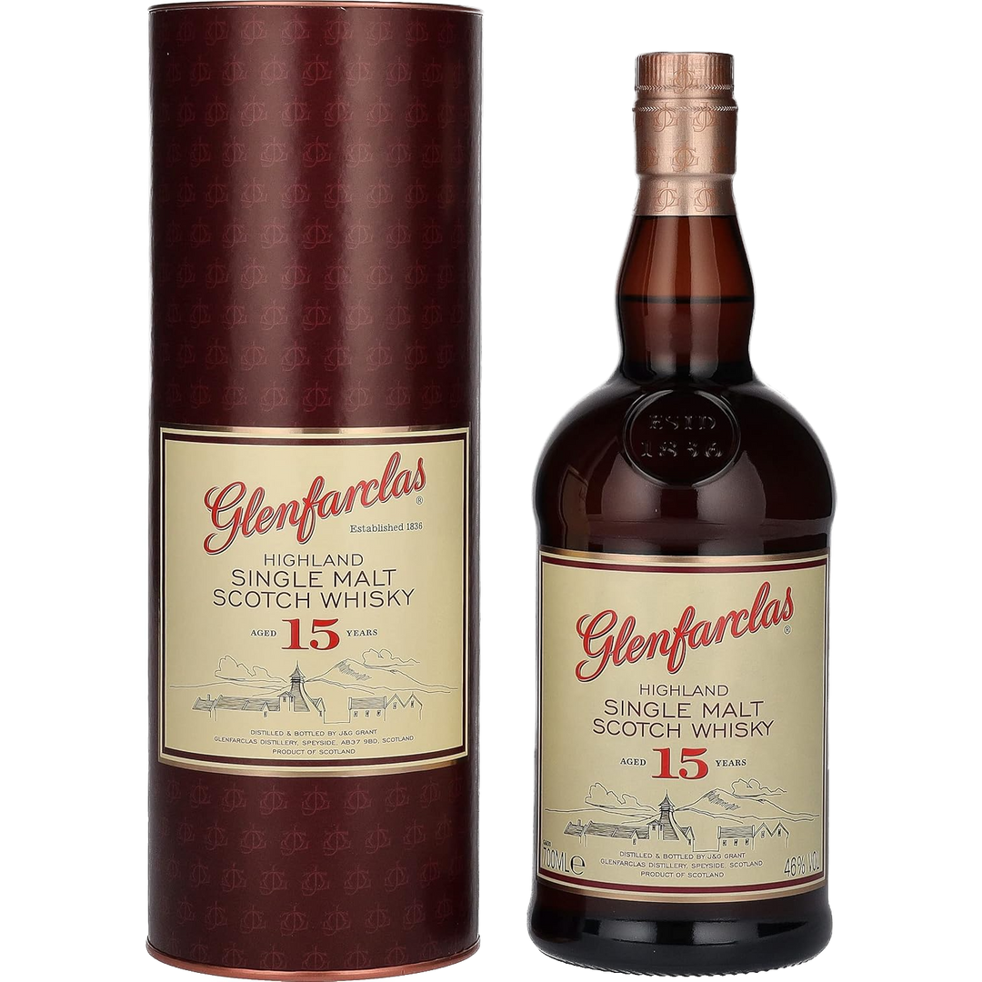 A bottle of Glenfarclas 15 Year Old Single Malt Scotch Whisky stands beside its cylindrical box, both displaying cream-colored labels accented with red and gold.
