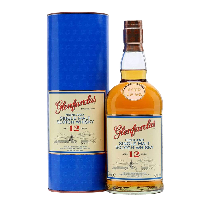A bottle of Glenfarclas 12 Year Old Single Malt Scotch Whisky is displayed beside its blue cylindrical container, both adorned with cream labels highlighted by red and gold accents.