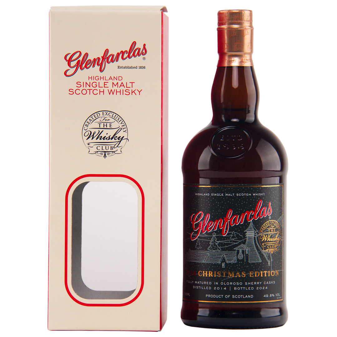 A bottle of Glenfarclas 2024 Christmas Edition Single Malt Whisky stands by its cream box with red lettering and a clear window, highlighting spirit aged in rich Oloroso sherry cask.
