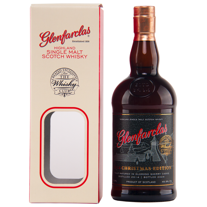 A bottle of Glenfarclas 2024 Christmas Edition Single Malt Whisky stands by its cream box with red lettering and a clear window, highlighting spirit aged in rich Oloroso sherry cask.