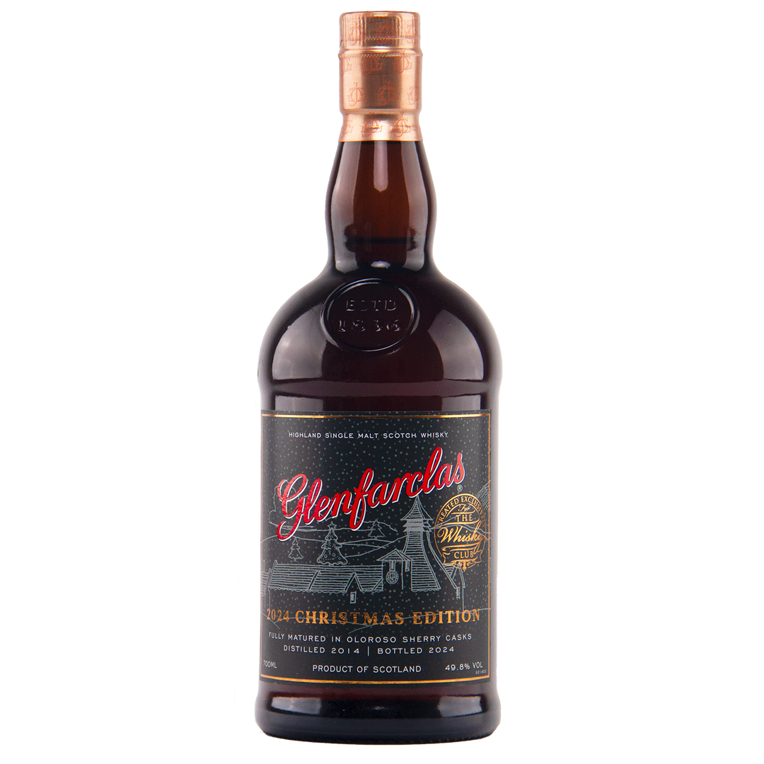 A bottle of Glenfarclas 2024 Christmas Edition Single Malt Whisky, showcasing a festive black and gold label with red accents and a snowy distillery design. Matured in Oloroso sherry casks for rich seasonal flavour.