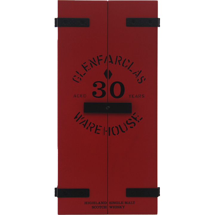 A red box with black hinges and handles reads "Glenfarclas 30 year old" on the front, resembling warehouse doors. Below, it says Highland Single Malt Scotch Whisky—reflecting the sherried excellence of this Speyside malt.