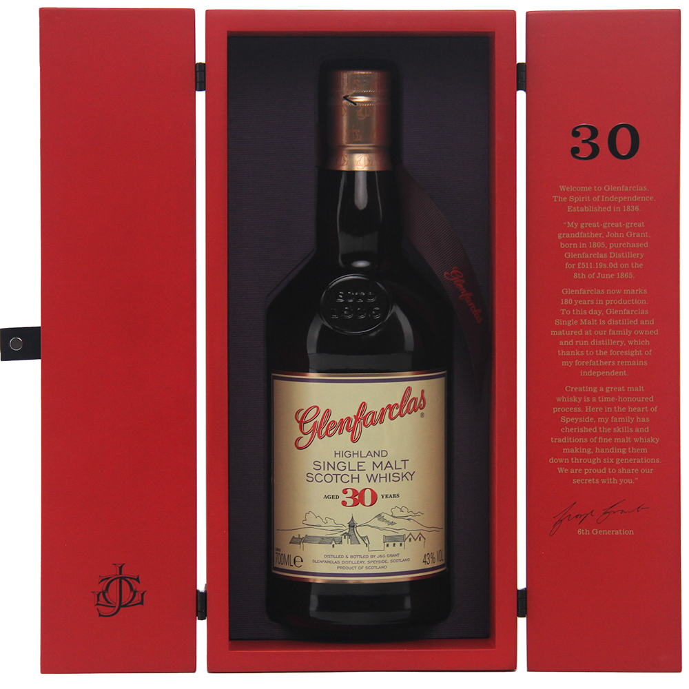 A bottle of Glenfarclas 30 Year Old stands upright in an open red box, showcasing gold and black labels and inside lid text that highlights this acclaimed Speyside single malt.