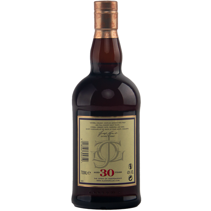 A bottle of Glenfarclas 30 Year Old Speyside single malt whisky features a sherried profile, a beige back label with "30 years" in large red text, decorative monogram, product details, and topped with a copper-colored cap.