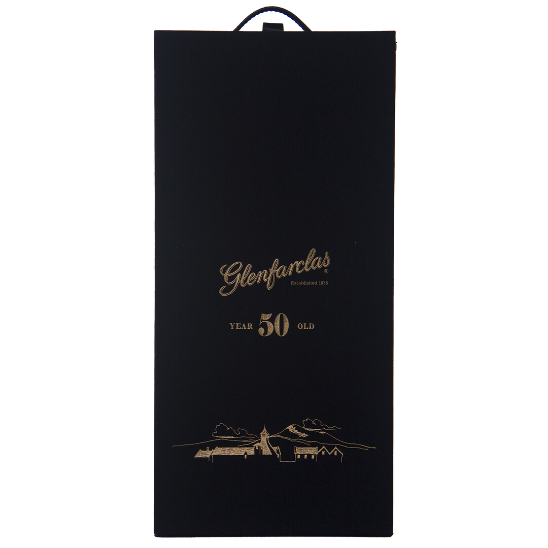 A black box with gold text reading Glenfarclas 50 year old Single Malt Scotch Whisky, Established 1836, plus a gold distillery and landscape illustration—honoring the legacy of this famed Highland sherried single malt.