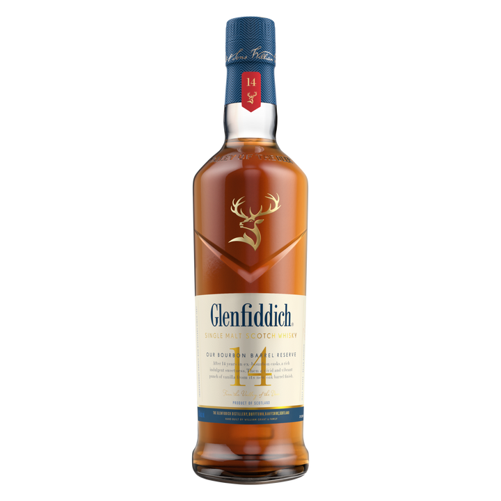 A bottle of Glenfiddich 14 Year Old Bourbon Barrel Reserve Single Malt Scotch Whisky with a blue cap, gold stag logo, cream label, and red and gold accents highlighting its bourbon barrel reserve.