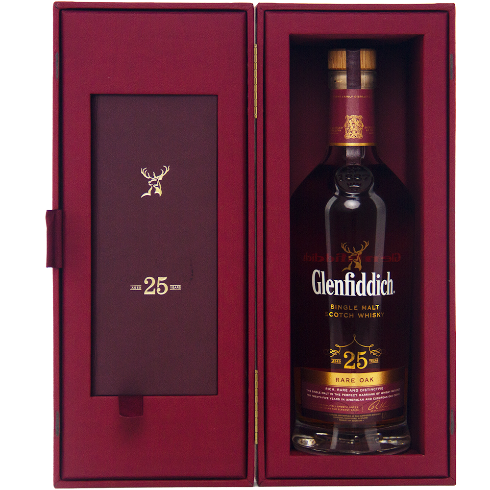 Glenfiddich 25 Year Old Rare Oak Single Malt Scotch Whisky from Speyside, presented in a maroon box with a gold stag logo and “25” on the inside cover. The label celebrates its distinguished Rare Oak character.