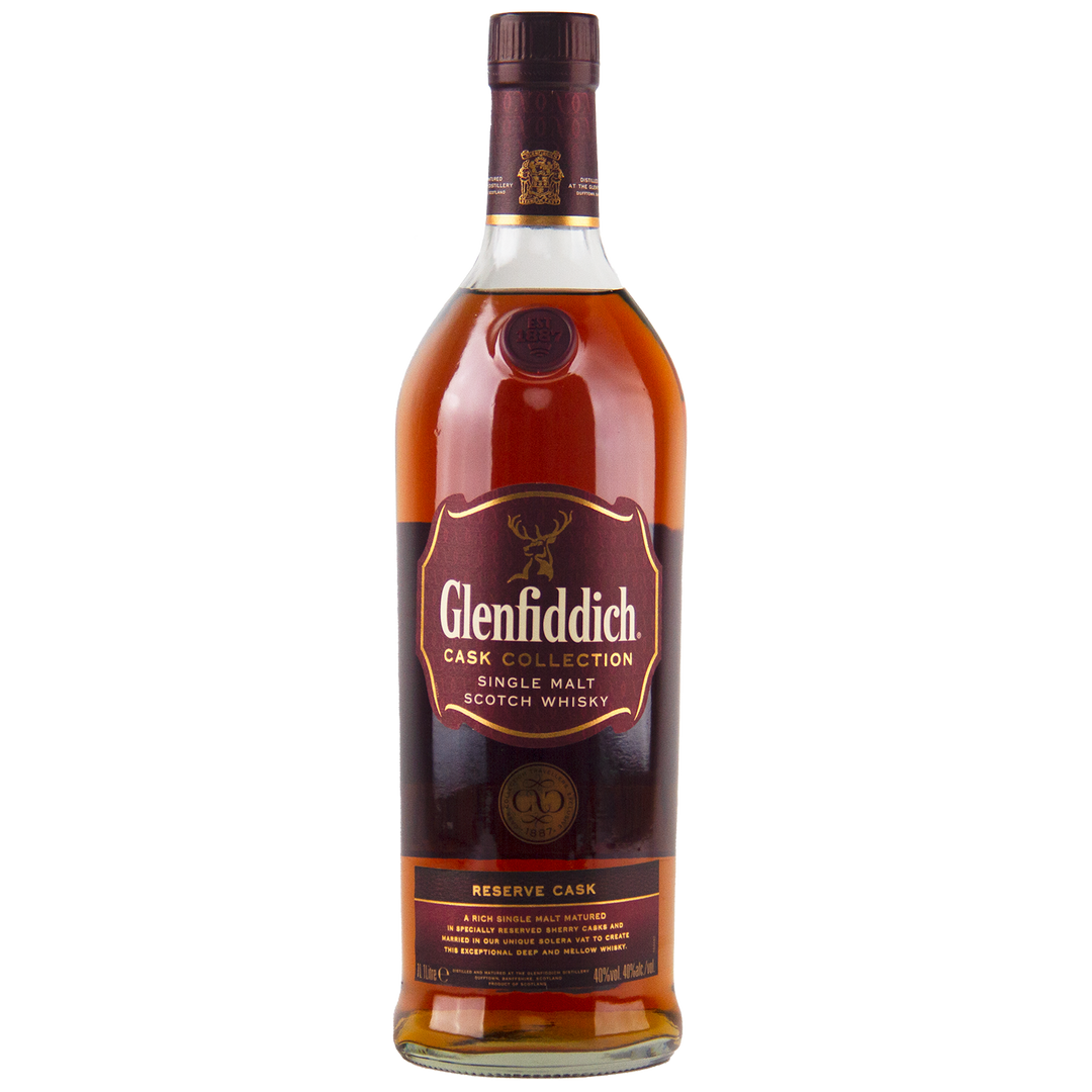 A bottle of Glenfiddich Cask Collection Reserve Cask Single Malt Scotch Whisky, with a maroon and gold label and the iconic stag emblem, showcases its Solera vat maturation against a plain white background.