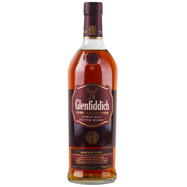 A bottle of Glenfiddich Cask Collection Reserve Cask Single Malt Scotch Whisky, with a maroon and gold label and the iconic stag emblem, showcases its Solera vat maturation against a plain white background.