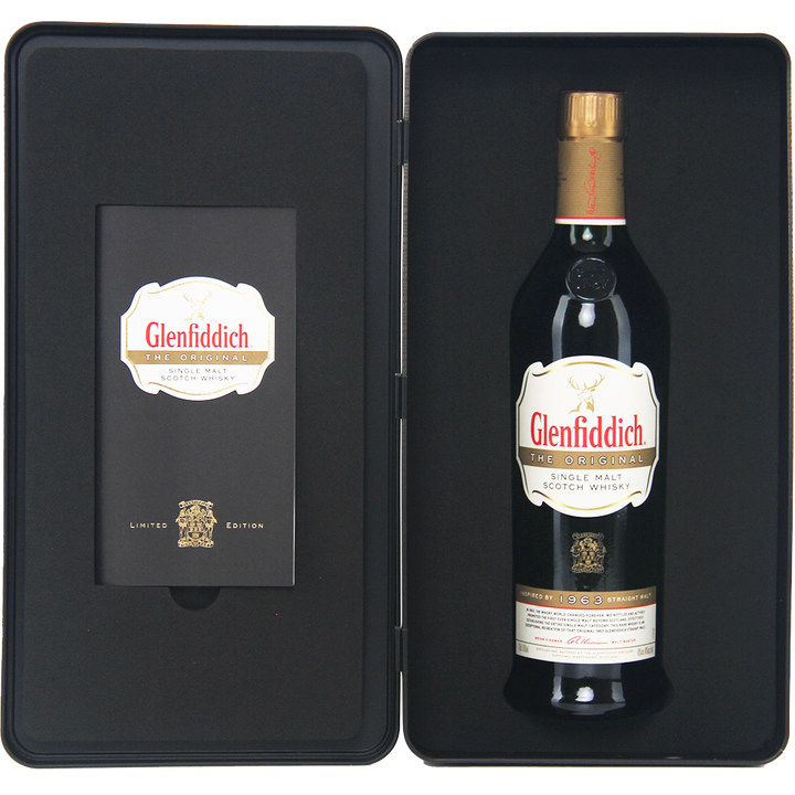 A sleek black gift box featuring Glenfiddich The Original Single Malt Scotch Whisky with a white and gold label, paired with a booklet. This limited edition set comes in custom packaging for an elegant presentation.