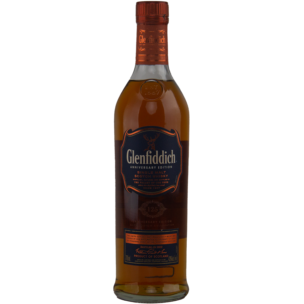 A bottle of Glenfiddich 125th Anniversary Edition Single Malt Scotch Whisky with dark amber liquid, a blue and gold label, and an orange cap. Matured in European oak casks to celebrate Glenfiddich’s milestone anniversary.