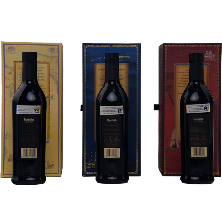 Three dark bottles from the Glenfiddich Age of Discovery Collection Single Malt Scotch Whisky are shown with decorative boxes, backs facing forward—an ideal addition to any whisky enthusiast’s collection.