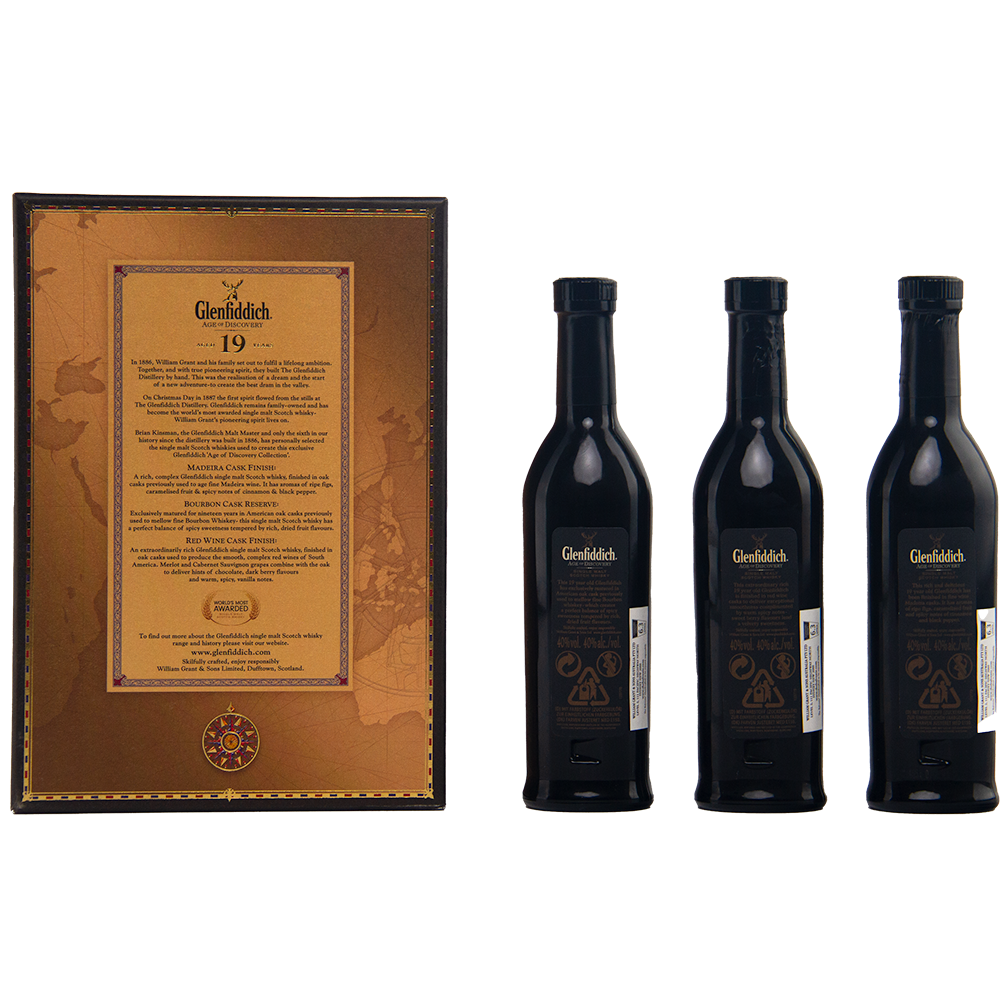 Three Glenfiddich Age of Discovery Single Malt Scotch Whisky bottles (3 x 200ml) are displayed beside a gift pack box with detailed text and a map design. Each bottle features the classic dark glass and gold label.