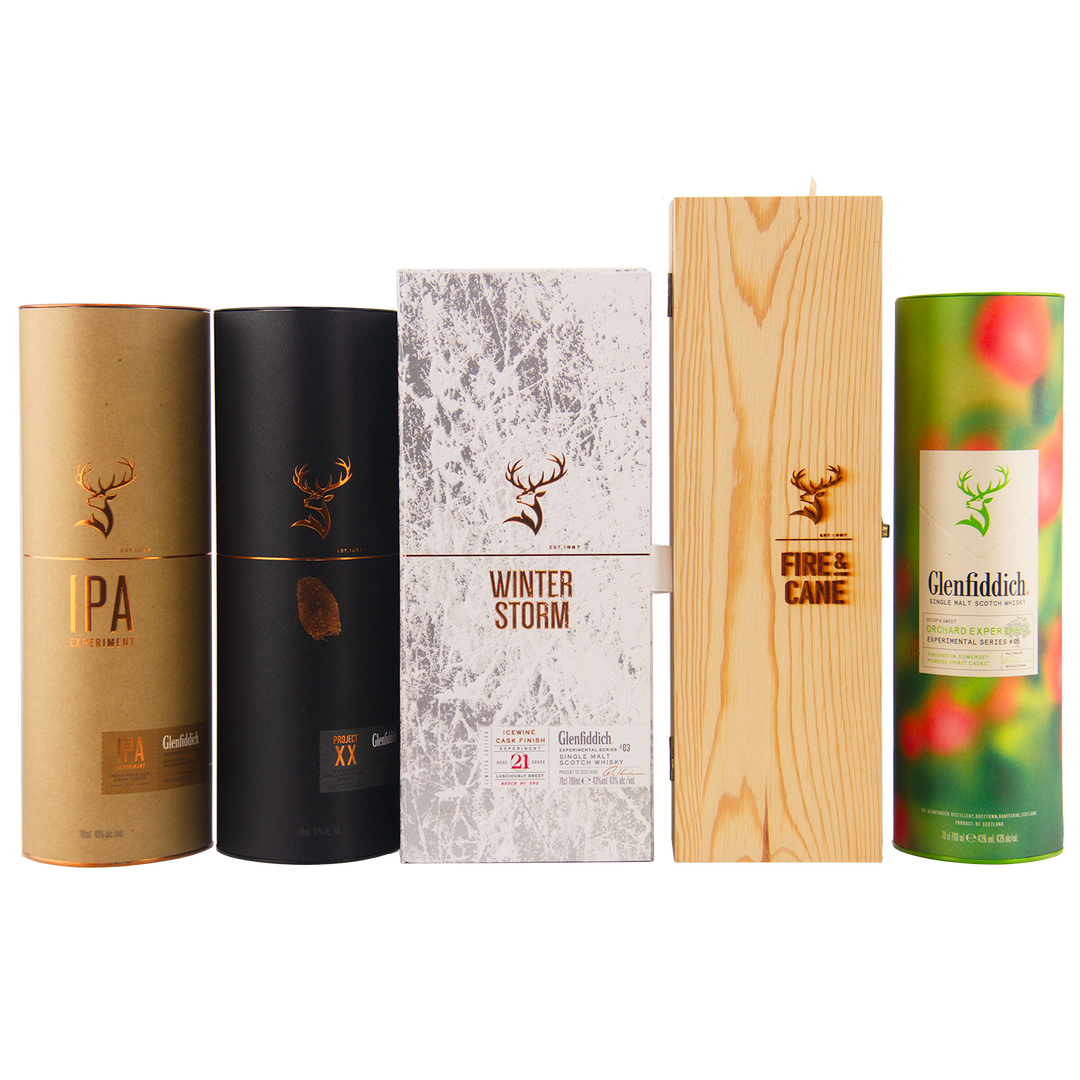 Five Glenfiddich Experiment Series 1-5 Single Malt Scotch Whisky boxes—IPA, Project XX, Winter Storm, Fire & Cane, and a green apple-themed design—stand side by side, each featuring the signature stag logo.